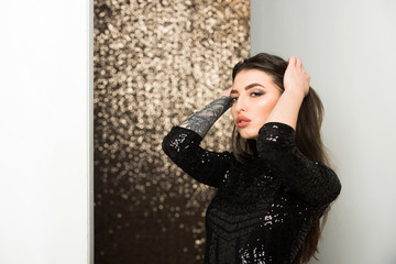 beautiful woman or girl model pose in fashion black dress