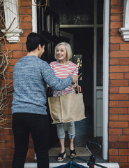Delivering Groceries To The Elderly - obrazy, fototapety, plakaty