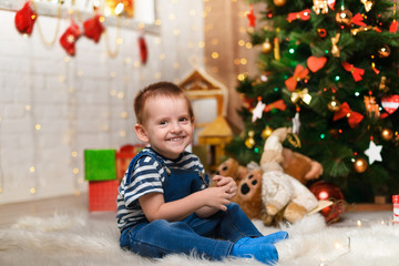 Little Boy In Christmas Decoration, Happy Emotions, Winter Holidays Concept