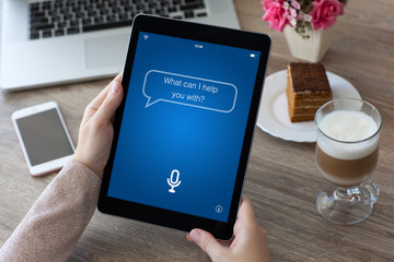 woman hands holding tablet computer PC with app personal assistant