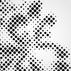 Halftone abstract black dots design element isolated on a white background.