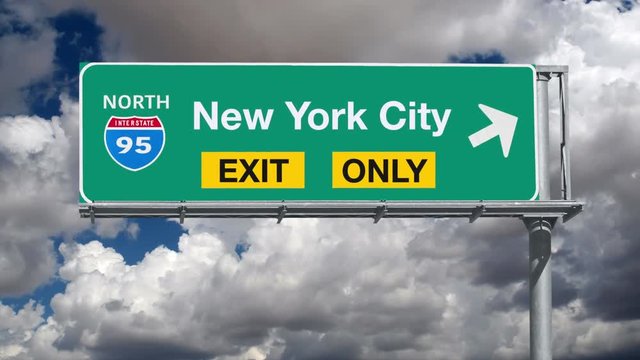 New York City Interstate 95 Exit Sign with Time Lapse Clouds and Zoom