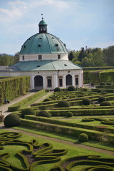 Famous Unesco gardens in Kromeriz town (in Czech Republic) with its green gardens in symmetrical pattern and decorated chateau