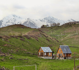Fototapeta na wymiar Gudauri village in Georgia country. The majestic and beautiful mountains of the Caucasus in spring time