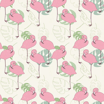 Floral vector seamless pattern with  tropical palm leaves and flamingo birds. Green leaves ,pink birds on light turquoise background with worn out texture.
