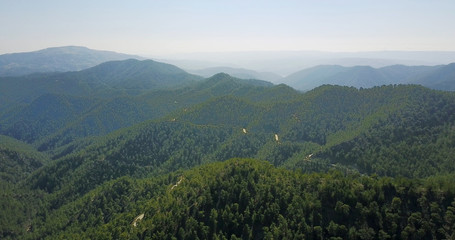 cedar valley. landscape of mountains in the mist Cyprus.Drone Point of View Platres in the Troodos. Cyprus. Aerial View. Flying over the mountains 