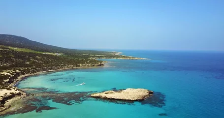 Foto op Plexiglas Landscape of a transparent clear blue Mediterranean Sea. The island of Cyprus. Resort. blue lagoon Yacht © Kateryna
