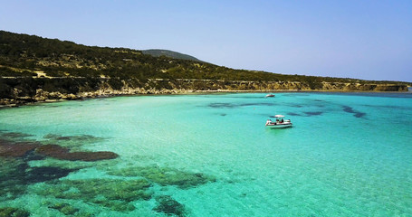 Fototapeta premium Landscape of a transparent clear blue Mediterranean Sea. The island of Cyprus. Resort. blue lagoon Yacht