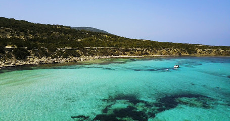 Fototapeta na wymiar Landscape of a transparent clear blue Mediterranean Sea. The island of Cyprus. Resort. blue lagoon