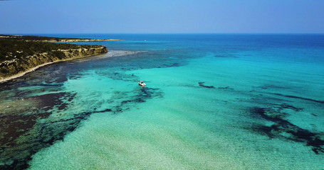 Landscape of island  a transparent clear blue Mediterranean Sea. The island of Cyprus. Resort.