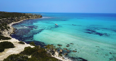 Fototapeta na wymiar Landscape of island a transparent clear blue Mediterranean Sea. The island of Cyprus. Resort.