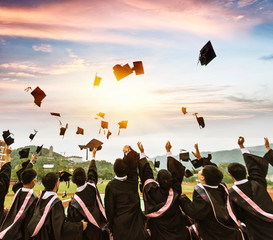 Asian college graduates wear baccalaureate suits and look to the future