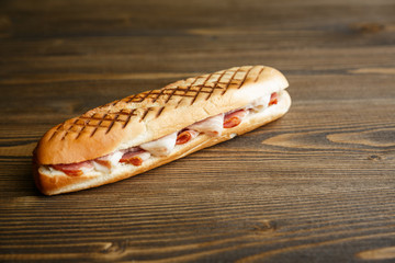 Toasted baguette sandwich with ham