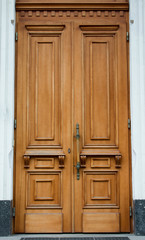 a brown wood old door in the centre of Kiev