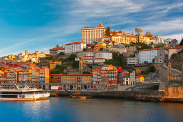 Fototapeta na wymiar Douro river, Ribeira and Dom Luis I or Luiz I iron bridge in the sunny morning Porto, Portugal.