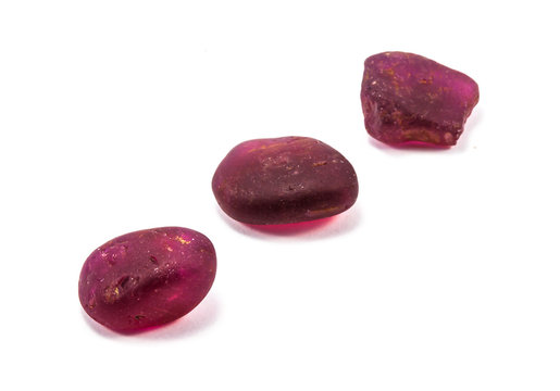 Pile Of Raw Natural Ruby On White Background