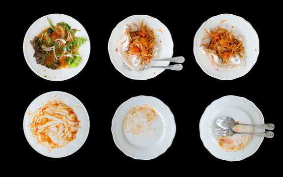 dirty plate after finished the meal isolated on black background