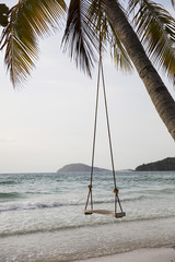 Swing on a tropical beach