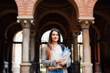 Portrait of female university student outdoors on Campus