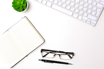 open daily, a computer and a smartphone on the desktop in the office