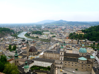 Fototapeta na wymiar Stunning view of Salzburg Cityscape with Salzach River as seen from Hohensalzburg Castle, Austria