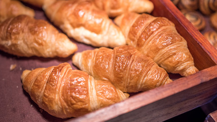 Croissant In Wooden Tray