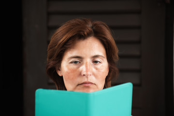 A woman reading the electronic book