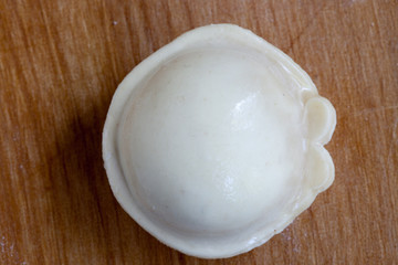 Home made dumplings on the cutting board