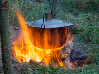 Cooking a meal on a campfire