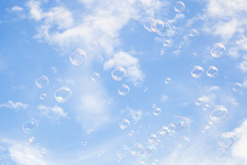 Blue sky and soap bubbles, abstract background
