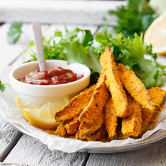 Zucchini sticks with tomato sauce