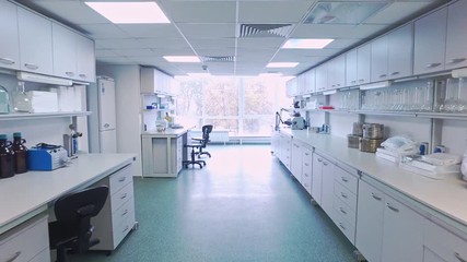 Research laboratory interior. Point of view empty science laboratory room. Pov of medical laboratory workplace. Walking in modern medical lab room. Science laboratory room - Powered by Adobe
