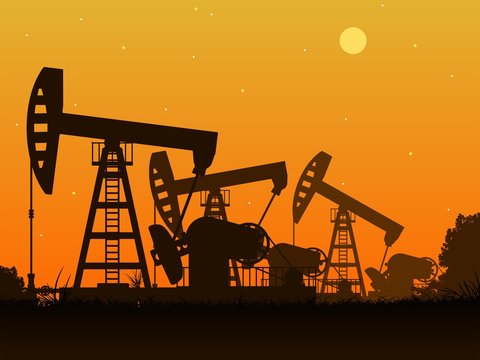 Silhouettes of oil pumps. Oil production. Pump rocking. Oil industry. Vector illustration.
