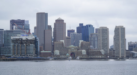 Obraz premium Skyline of Boston - view from Boston Harbor - BOSTON , MASSACHUSETTS - APRIL 3, 2017