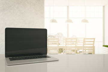 Empty laptop in kitchen