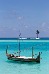 Fototapeta na wymiar Boat and Island, Maldives