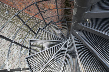 Downward Spiral, Spiral staircase in old town in Warsaw, Poland