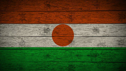 Flag of Niger on old wood boards