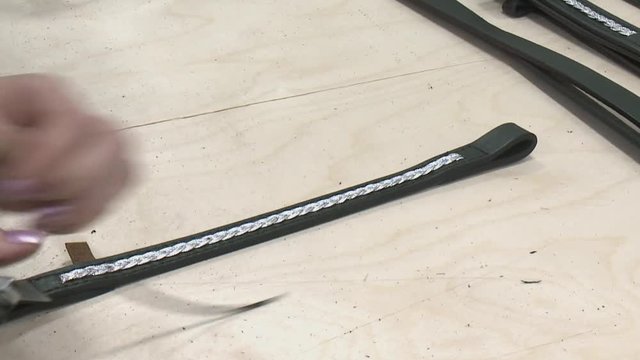 Horse harness manufacturing at the factory