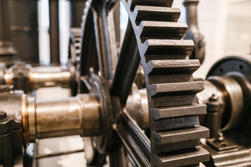 large cogwheel gear in metal machine work shop