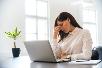 Stressed businesswoman in the office