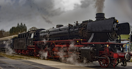 vintage black steam powered railway train