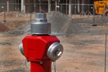 New fire hydrant on building site. Street construction. Fire safety.