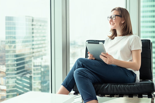 Smiling Business Woman Working In Modern Office