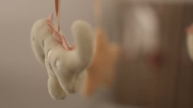 Baby crib spinner going in and out of focus