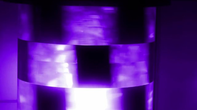Rotating neon light.