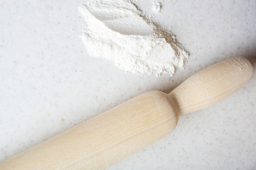  Rolling pin with flour on the table. Rolling pin with flour on the table for making pastry dishes and rolling dough