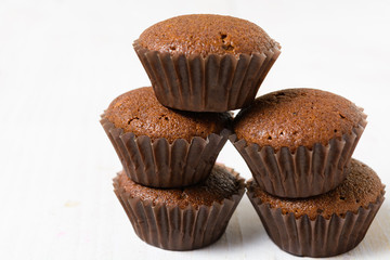 Stack of five cocoa muffins