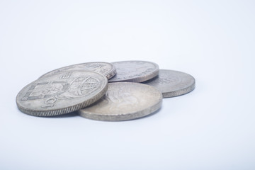 Vintage old pocket change coins isolated on white background