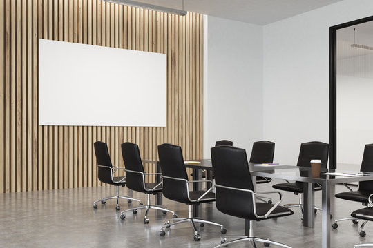 Wooden meeting room with poster